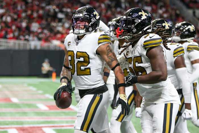 New Orleans Saints safety Tyrann Mathieu (32) celebrates with teammates after an interception